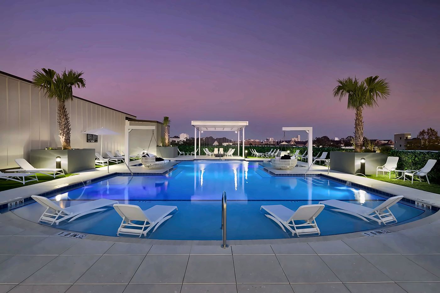 The rooftop pool at dusk